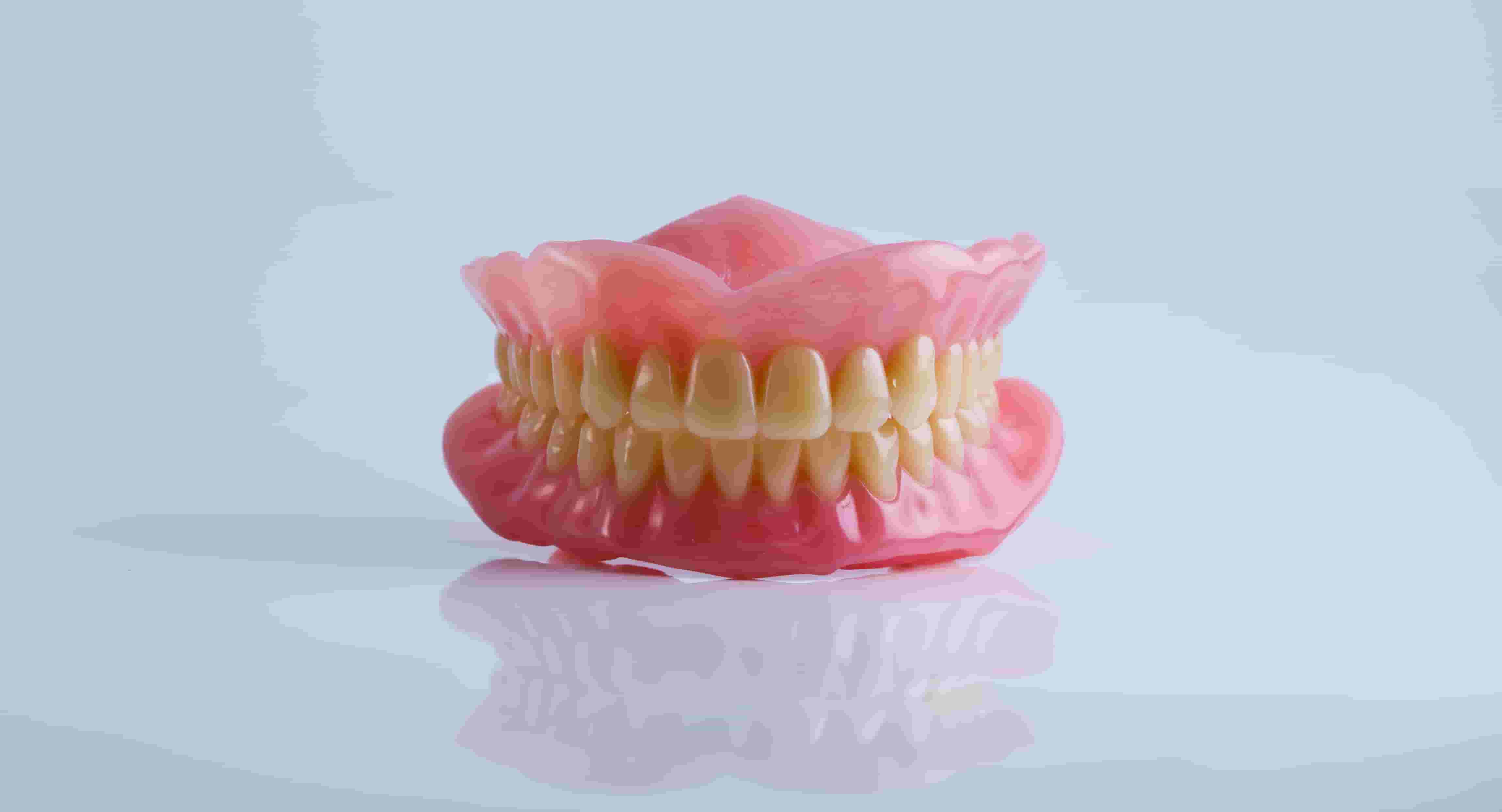 Denture Options Decoded: Navigating the Choice Between Implant Overdentures and Traditional Dentures